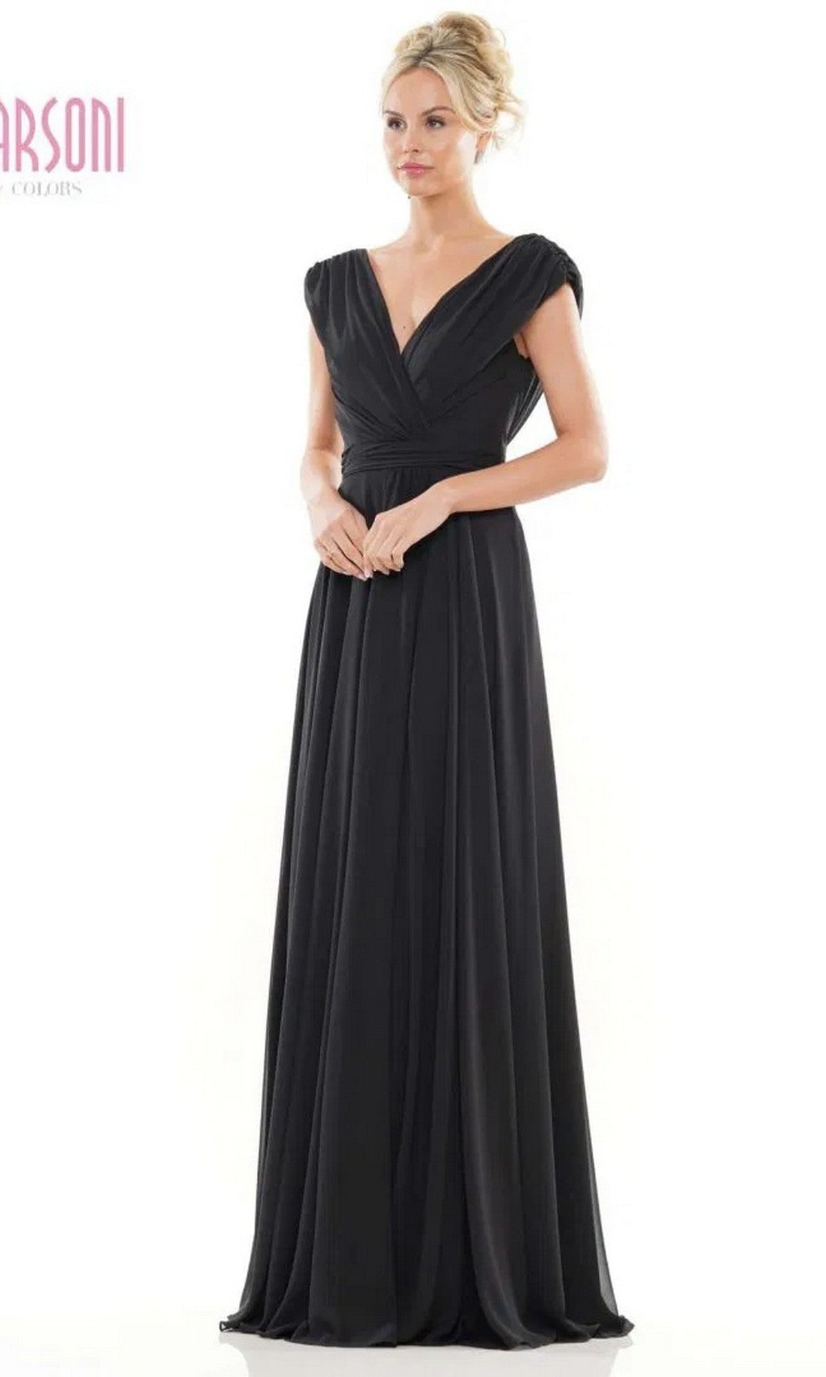 A woman models the Marsoni M251 long formal black dress, featuring short sleeves and a V-neckline, against a white background.